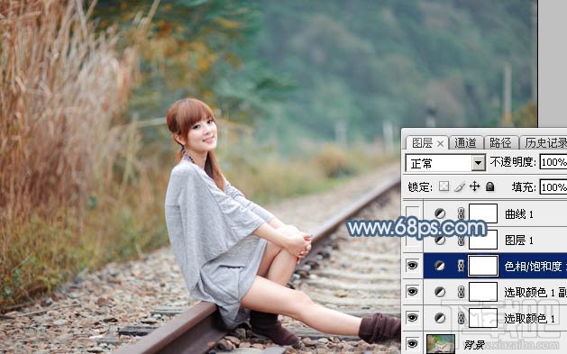 如何用Photoshop CC给铁轨上的美女加上梦幻的淡蓝色