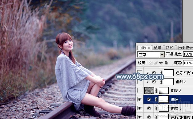 如何用Photoshop CC给铁轨上的美女加上梦幻的淡蓝色