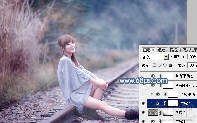 如何用Photoshop CC给铁轨上的美女加上梦幻的淡蓝色